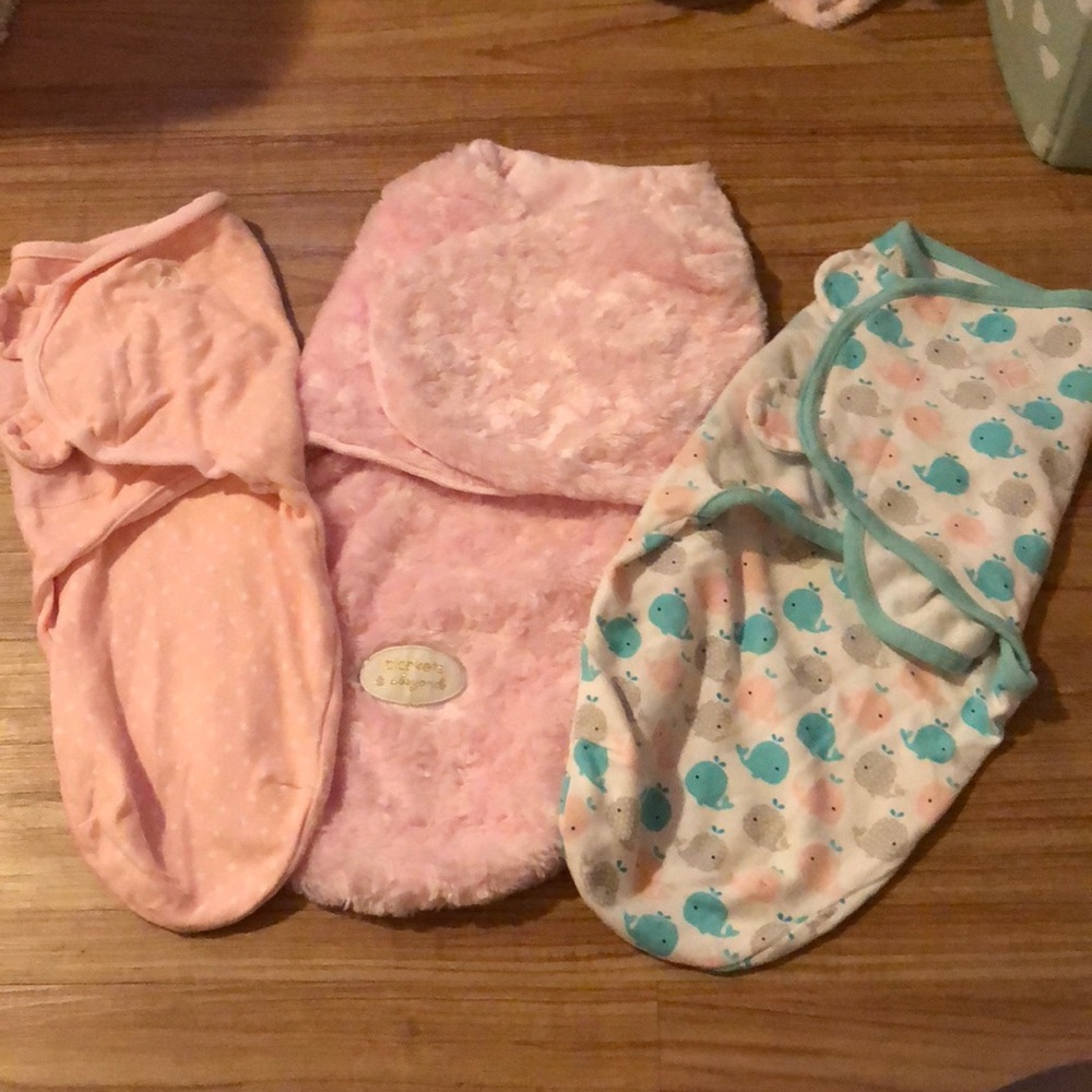 Baby girl swaddles
